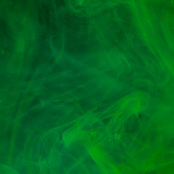 Abstract visualization of energy flow with green and teal colors.